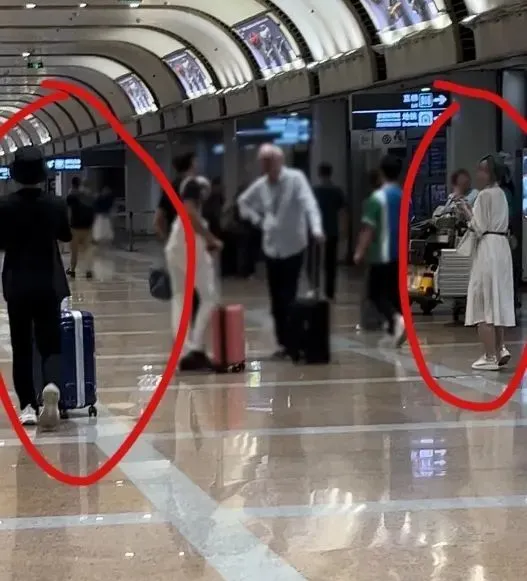 The white skirt girl is said to be a lover of scout and a scandalous employee of LNG